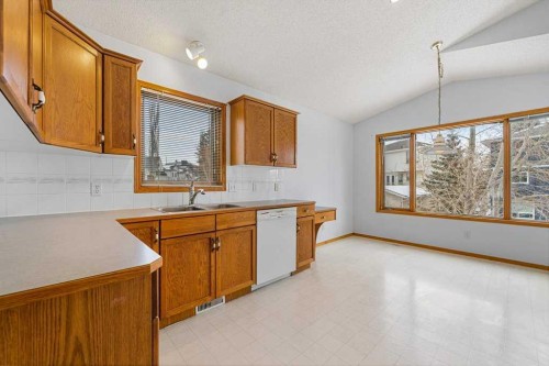 9119 Scurfield Drive Nw, Calgary, AB - Indoor Photo Showing Kitchen With Double Sink
