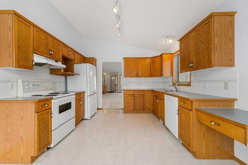 9119 Scurfield Drive Nw, Calgary, AB - Indoor Photo Showing Kitchen With Double Sink