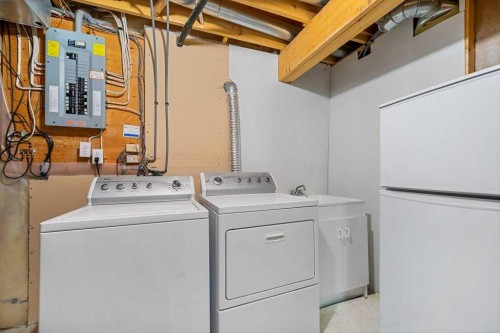 9119 Scurfield Drive Nw, Calgary, AB - Indoor Photo Showing Laundry Room