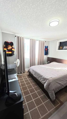 264049 Range Rd 41 Range, Cochrane, AB - Indoor Photo Showing Bedroom