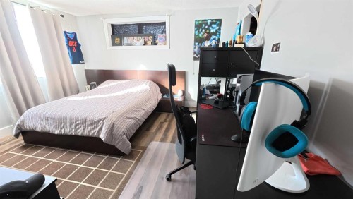 264049 Range Rd 41 Range, Cochrane, AB - Indoor Photo Showing Bedroom