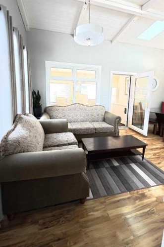 264049 Range Rd 41 Range, Cochrane, AB - Indoor Photo Showing Living Room