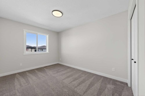 420 Lewiston Landing Ne, Calgary, AB - Indoor Photo Showing Other Room
