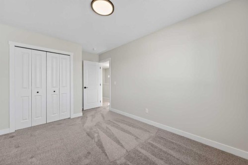 420 Lewiston Landing Ne, Calgary, AB - Indoor Photo Showing Other Room