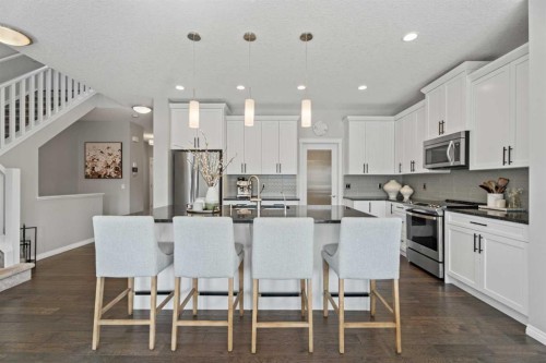 11 Mount Rae Heights, Okotoks, AB - Indoor Photo Showing Kitchen With Stainless Steel Kitchen With Upgraded Kitchen