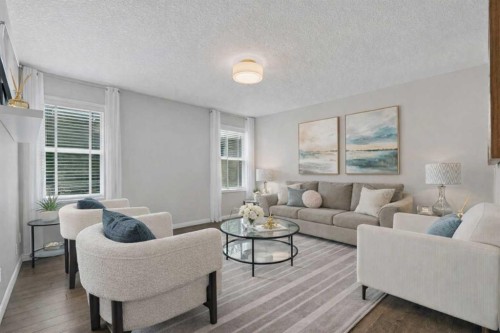 11 Mount Rae Heights, Okotoks, AB - Indoor Photo Showing Living Room