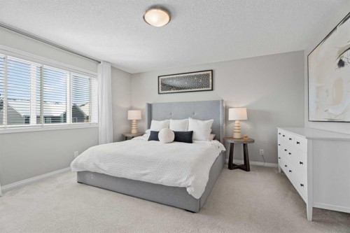 11 Mount Rae Heights, Okotoks, AB - Indoor Photo Showing Bedroom