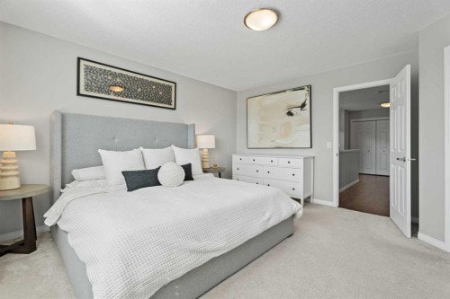 11 Mount Rae Heights, Okotoks, AB - Indoor Photo Showing Bedroom