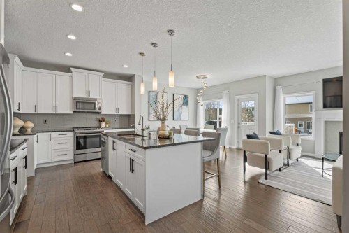 11 Mount Rae Heights, Okotoks, AB - Indoor Photo Showing Kitchen With Stainless Steel Kitchen With Upgraded Kitchen