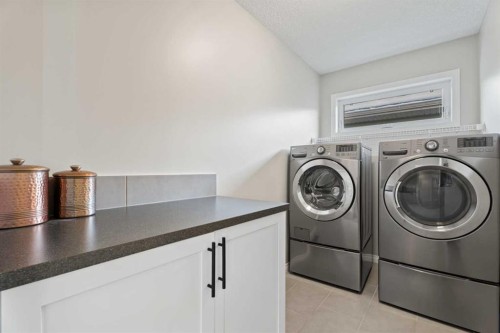 11 Mount Rae Heights, Okotoks, AB - Indoor Photo Showing Laundry Room