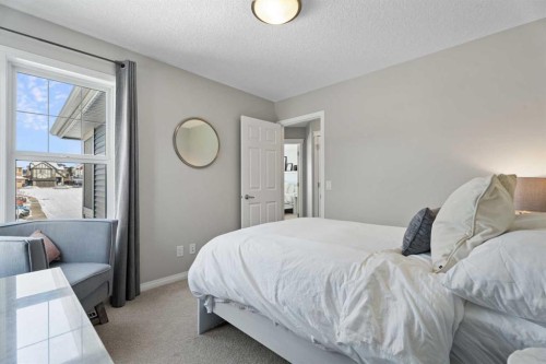 11 Mount Rae Heights, Okotoks, AB - Indoor Photo Showing Bedroom