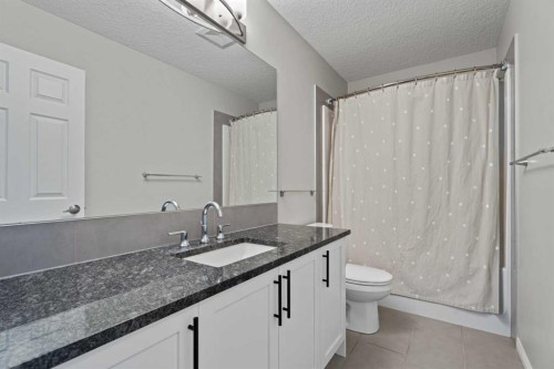 11 Mount Rae Heights, Okotoks, AB - Indoor Photo Showing Bathroom