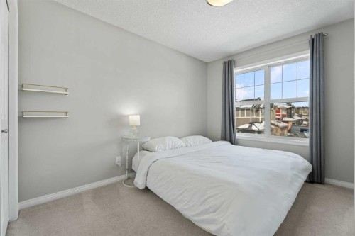 11 Mount Rae Heights, Okotoks, AB - Indoor Photo Showing Bedroom