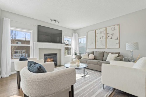 11 Mount Rae Heights, Okotoks, AB - Indoor Photo Showing Living Room With Fireplace