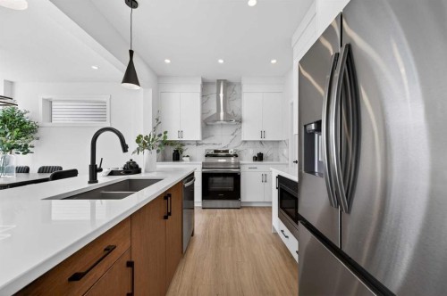 473 Lewiston Landing Ne, Calgary, AB - Indoor Photo Showing Kitchen With Stainless Steel Kitchen With Double Sink With Upgraded Kitchen