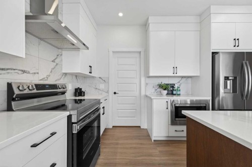 473 Lewiston Landing Ne, Calgary, AB - Indoor Photo Showing Kitchen With Stainless Steel Kitchen With Upgraded Kitchen