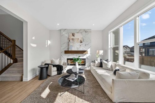 473 Lewiston Landing Ne, Calgary, AB - Indoor Photo Showing Living Room With Fireplace