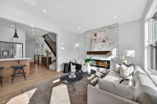 473 Lewiston Landing Ne, Calgary, AB - Indoor Photo Showing Living Room With Fireplace