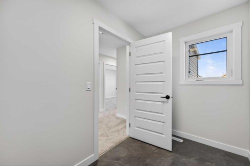 473 Lewiston Landing Ne, Calgary, AB - Indoor Photo Showing Other Room