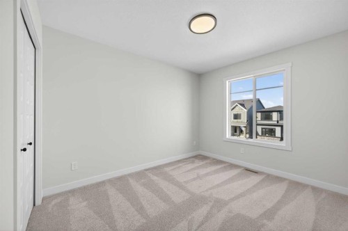 473 Lewiston Landing Ne, Calgary, AB - Indoor Photo Showing Other Room
