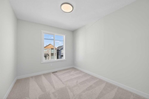 473 Lewiston Landing Ne, Calgary, AB - Indoor Photo Showing Other Room