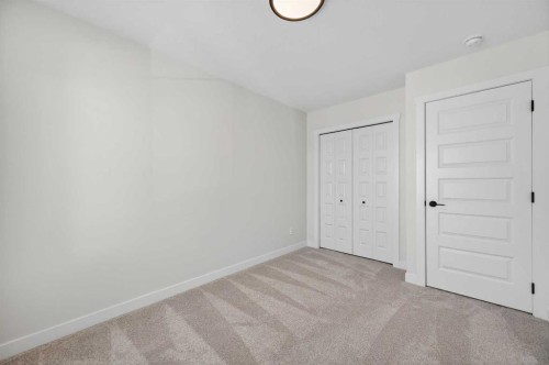 473 Lewiston Landing Ne, Calgary, AB - Indoor Photo Showing Other Room