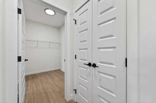 473 Lewiston Landing Ne, Calgary, AB - Indoor Photo Showing Other Room