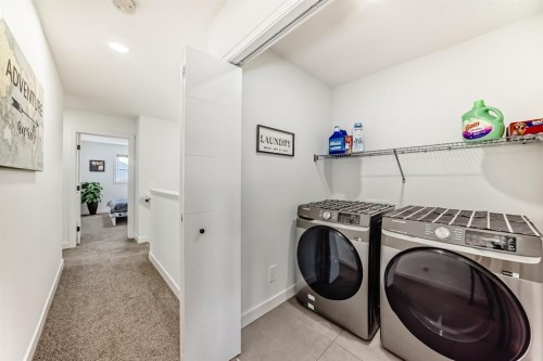 37 Legacy Glen Point Se, Calgary, AB - Indoor Photo Showing Laundry Room