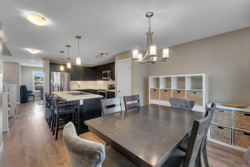 23 Copperpond Square Se, Calgary, AB - Indoor Photo Showing Dining Room