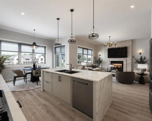 14 Bridges Way, Langdon, AB - Indoor Photo Showing Kitchen With Fireplace With Double Sink With Upgraded Kitchen