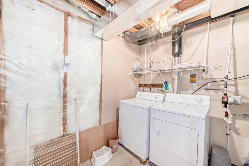 240 Prestwick Way Se, Calgary, AB - Indoor Photo Showing Laundry Room