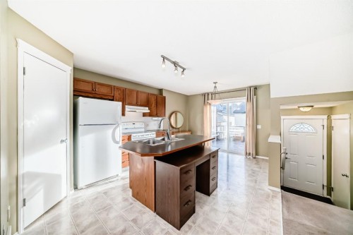 240 Prestwick Way Se, Calgary, AB - Indoor Photo Showing Kitchen With Double Sink