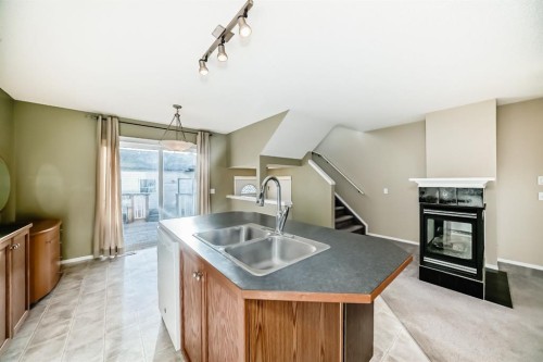 240 Prestwick Way Se, Calgary, AB - Indoor Photo Showing Kitchen With Double Sink
