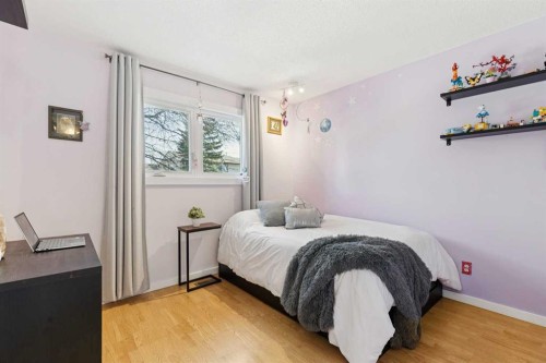 128-6100 4 Avenue Ne, Calgary, AB - Indoor Photo Showing Bedroom