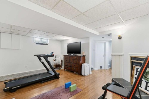 128-6100 4 Avenue Ne, Calgary, AB - Indoor Photo Showing Other Room