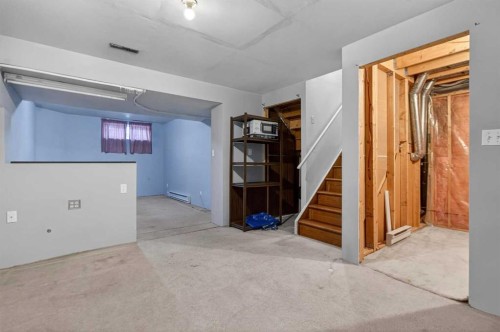 257 Fresno Place Ne, Calgary, AB - Indoor Photo Showing Other Room