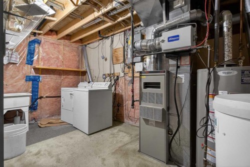 257 Fresno Place Ne, Calgary, AB - Indoor Photo Showing Laundry Room