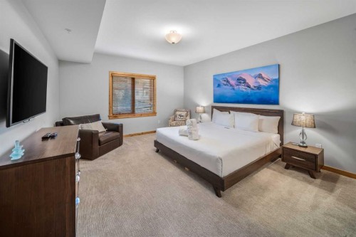 103-905 Spring Creek Drive, Canmore, AB - Indoor Photo Showing Bedroom