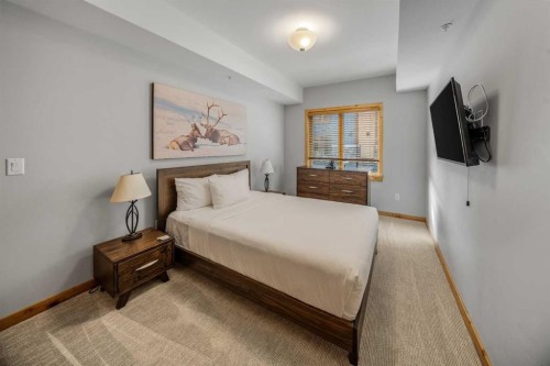 103-905 Spring Creek Drive, Canmore, AB - Indoor Photo Showing Bedroom