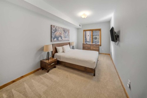 103-905 Spring Creek Drive, Canmore, AB - Indoor Photo Showing Bedroom
