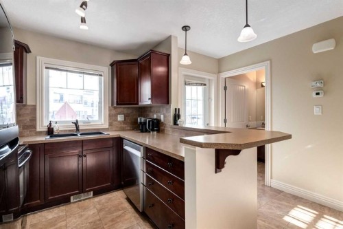 37 Royal Oak Plaza Nw, Calgary, AB - Indoor Photo Showing Kitchen With Double Sink