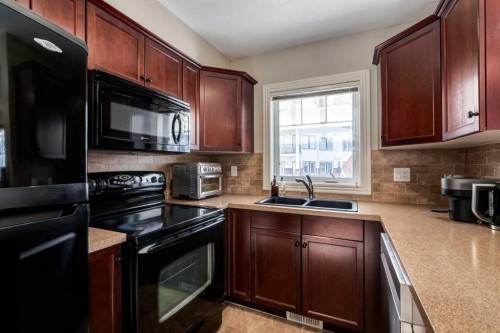 37 Royal Oak Plaza Nw, Calgary, AB - Indoor Photo Showing Kitchen With Double Sink