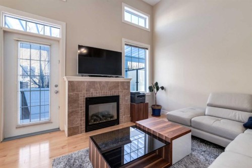 37 Royal Oak Plaza Nw, Calgary, AB - Indoor Photo Showing Living Room With Fireplace