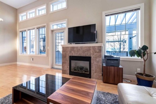 37 Royal Oak Plaza Nw, Calgary, AB - Indoor Photo Showing Living Room With Fireplace