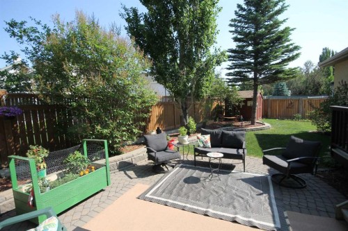 51 Cranleigh Gardens Se, Calgary, AB - Outdoor With Deck Patio Veranda With Backyard