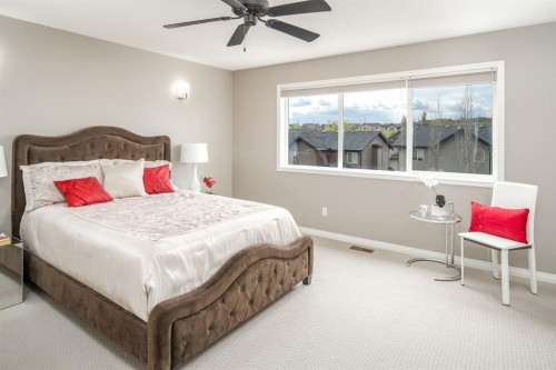 105 Aspen Stone Road Sw, Calgary, AB - Indoor Photo Showing Bedroom