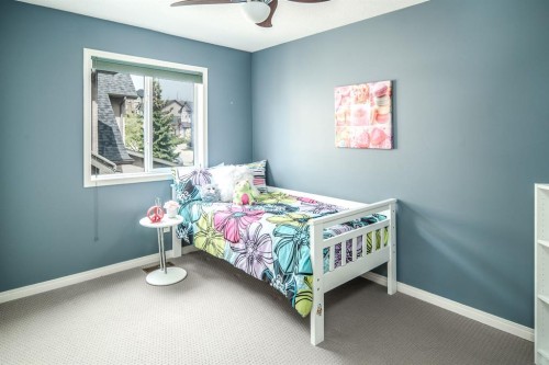 105 Aspen Stone Road Sw, Calgary, AB - Indoor Photo Showing Bedroom