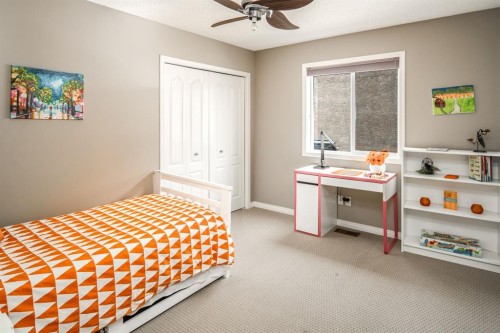 105 Aspen Stone Road Sw, Calgary, AB - Indoor Photo Showing Bedroom