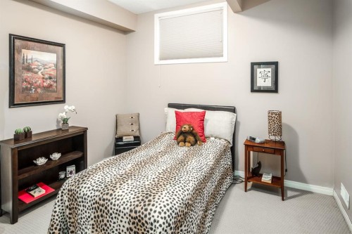 105 Aspen Stone Road Sw, Calgary, AB - Indoor Photo Showing Bedroom