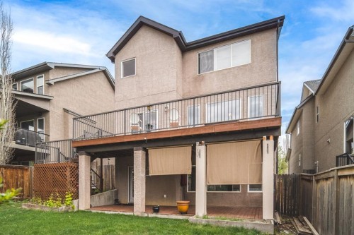 105 Aspen Stone Road Sw, Calgary, AB - Outdoor With Deck Patio Veranda With Exterior